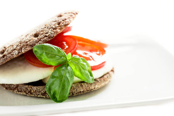 istock Sandwich with mozzarella tomatoes and rye bread 1280471780