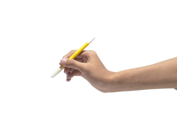 istock Person right hand using yellow marker on isolated white background 1280472183