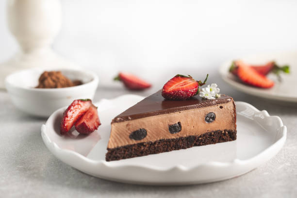 istock pastry item chocolate strawberry cheesecake in white background 1280473057
