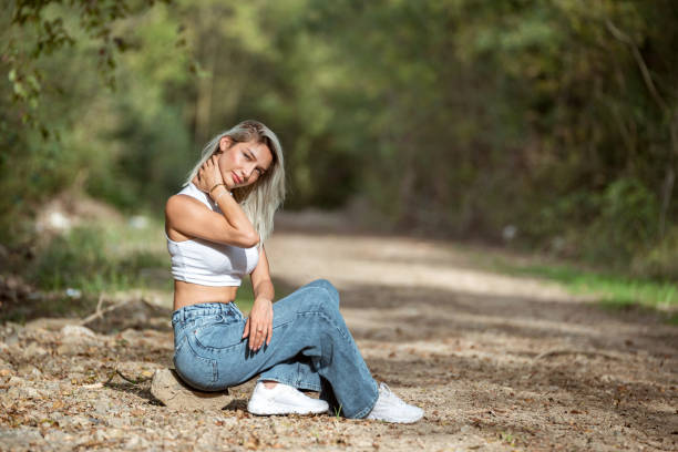 Beautiful woman on the walking path
