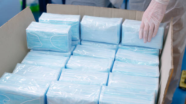 istock Face mask production line in modern factory 1280482334