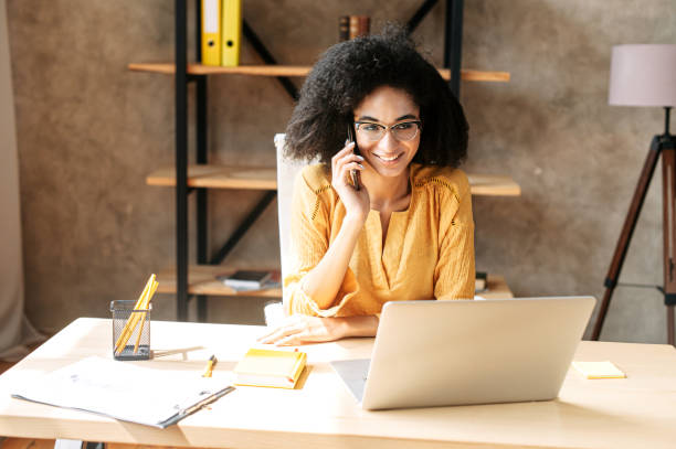 istock A young woman is using laptop at office 1280484848