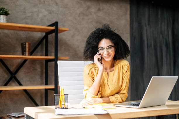 istock A young woman is using laptop at office 1280484850