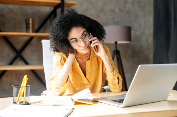 istock A young woman is using laptop at office 1280484856