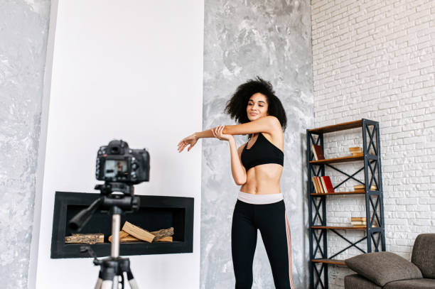 istock African woman records sports video tutorial 1280484876
