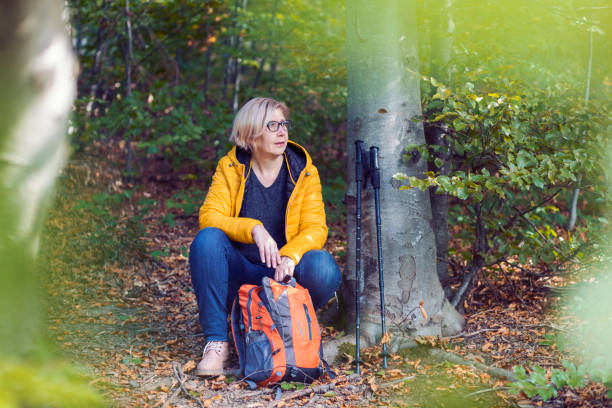 istock Mature woman out on a solo hike 1280488636