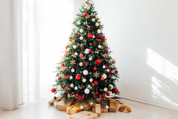 istock Christmas tree with decor gifts for new year interior holiday 1280494778