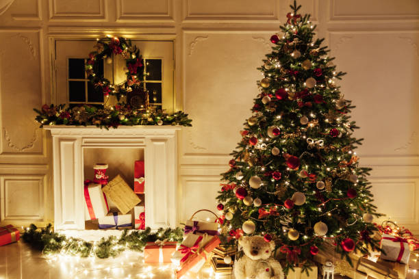 istock Christmas tree shines lights garlands New Year's Night warm light 1280495094