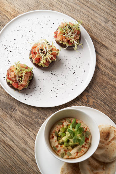 istock Salmon tartare with guacamole sauce 1280496989