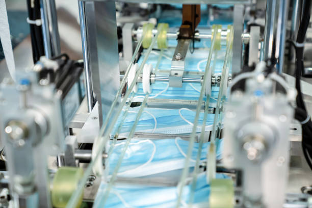 istock Face mask production line in modern factory 1280498714
