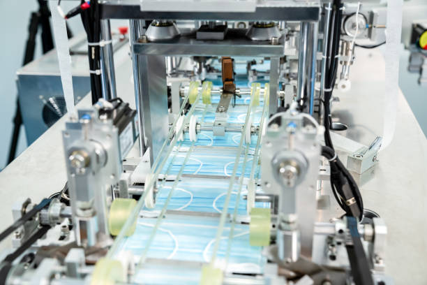 istock Face mask production line in modern factory 1280499798