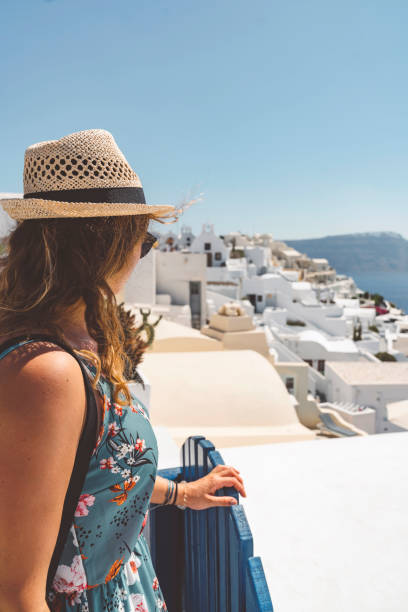 istock Woman on a trip to Santorini 1280501011