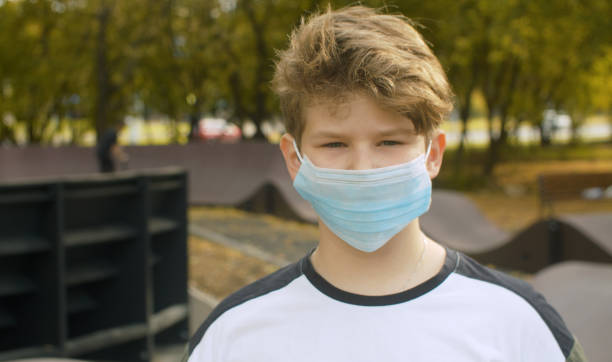 istock Boy in a medical mask 1280502724