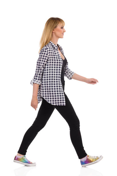 istock Confident Young Woman Is Walking And Looking Away. Side View. 1280503634