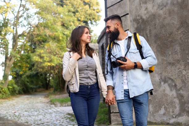 istock Young couple walking in an old town 1280509008