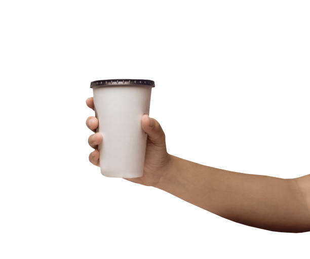 istock Hand holding paper cup isolated on white background with clipping path. 1280509460