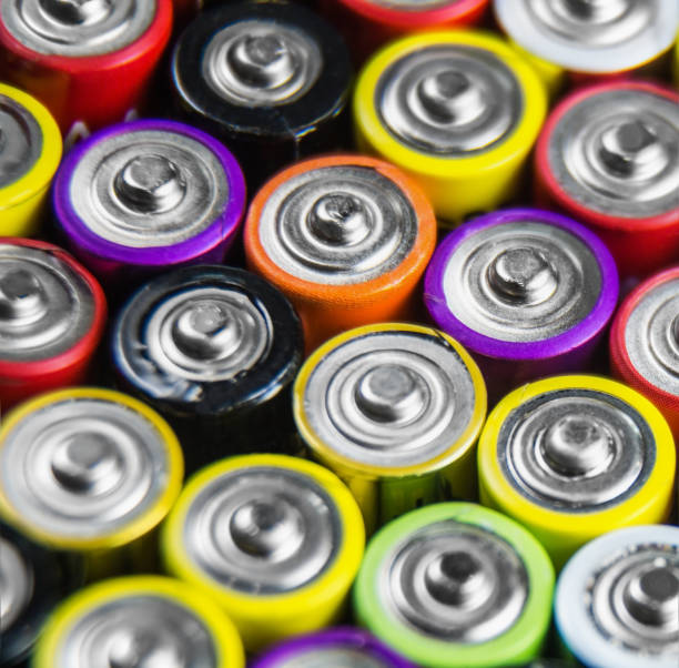 istock lots of alkaline used AAA batteries background 1280509477