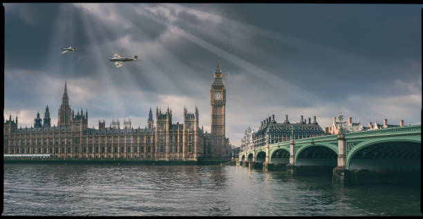модель spitfire над зданиями парламента, модель фотография - victoria tower стоковые фото и изображения