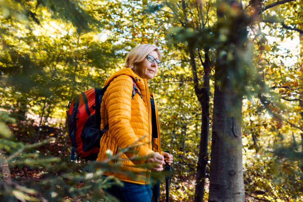 istock Mature woman out on a solo hike 1280509598