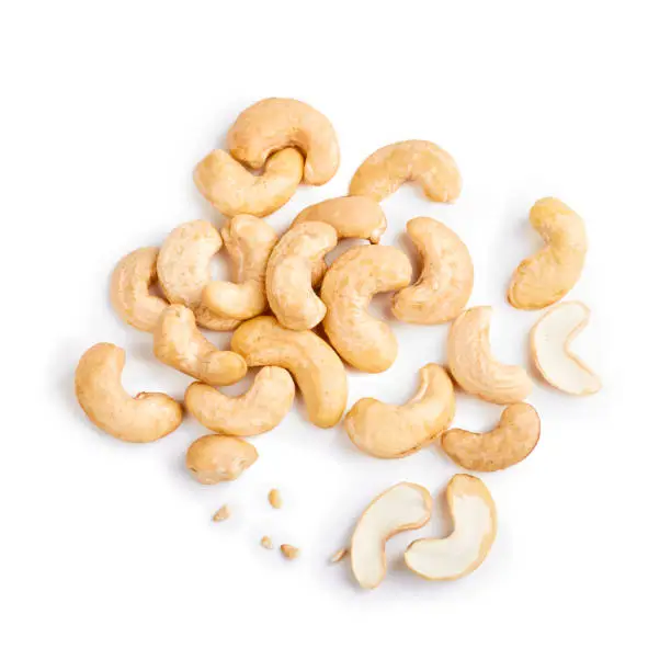 Cashew nuts isolated on white background. Top view