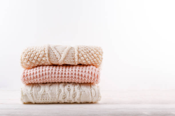 istock Bunch of autumnal knitted clothes. 1280511442