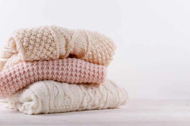 istock Bunch of autumnal knitted clothes. 1280511445