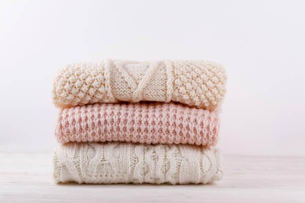 istock Bunch of autumnal knitted clothes. 1280511450