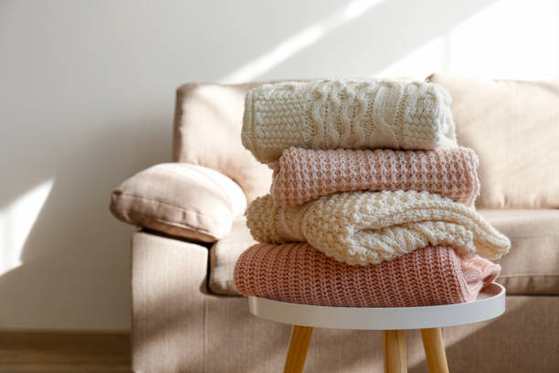 istock Bunch of autumnal knitted clothes. 1280511517