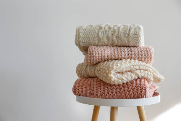 istock Bunch of autumnal knitted clothes. 1280511558