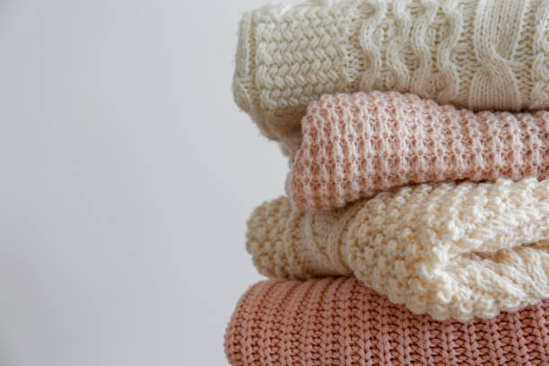 istock Bunch of autumnal knitted clothes. 1280511634