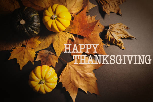 istock Happy Thanksgiving Day with pumpkin and maple leaves 1280512735