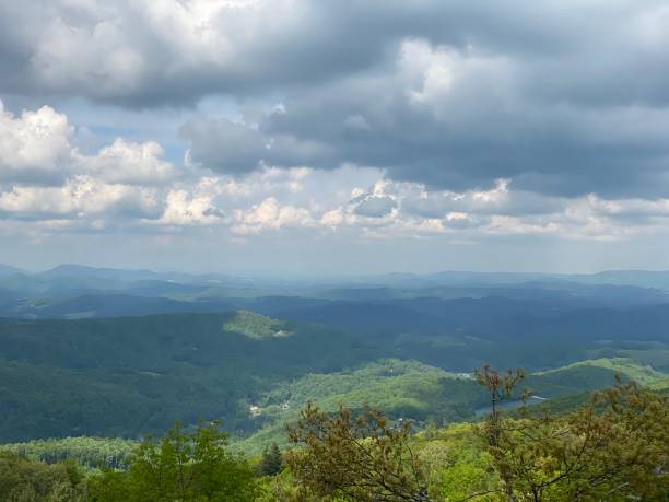 istock Beautiful Afternoon Mountain Views with clouds rolling in 1280516396