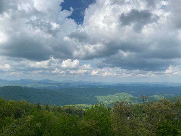 istock Beautiful Afternoon Mountain Views with clouds rolling in 1280516407