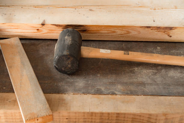 istock Carpenter's hammer and wood material. 1280517145