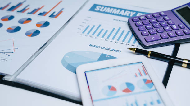 istock Close up calculator on table and financial paper planner document nobody. 1280517328