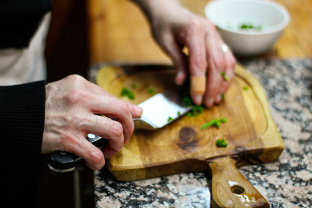 istock woman cooking  at home 1280531720