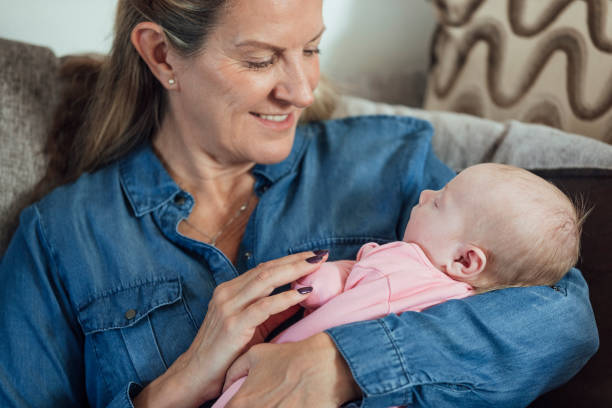 istock Grandma Cuddling Her Granddaughter 1280534685