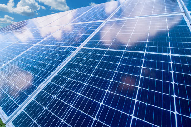 istock the panel solar, with reflection of clouds and the sky 1280540589