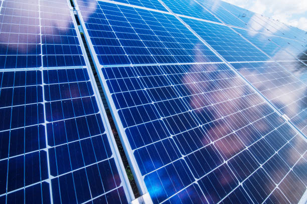 istock the panel solar, with reflection of clouds and the sky 1280540603