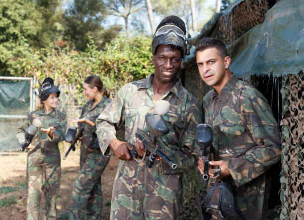 istock paintball players getting ready for match 1280543287