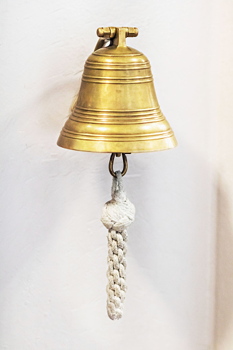 Ship's golden shining signal bell.