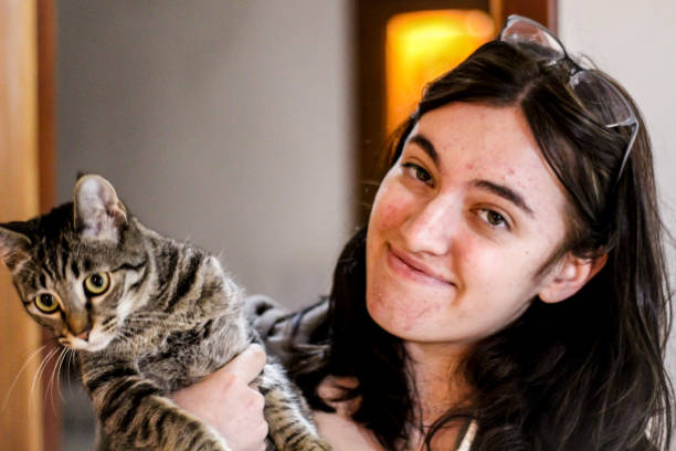 istock Teenager  and  her pet 1280550461
