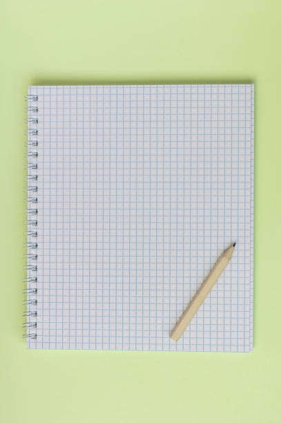 istock student empty notebook with wooden brown short penil on yellow background 1280555028