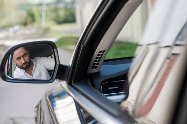 istock Business man in car 1280556810