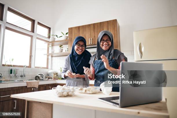 Senior Woman Doing Online Communication From Home With Her Daugher Stock Photo - Download Image Now