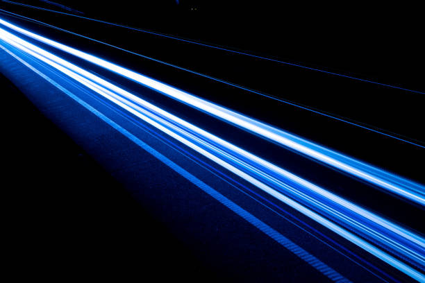 istock blue car lights at night. long exposure 1280558167