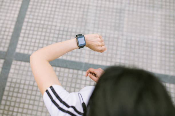 istock Woman wearing a smartwatch 1280562801