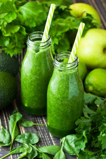 istock Fresh organic green smoothie with vegetables and greens 1280563531