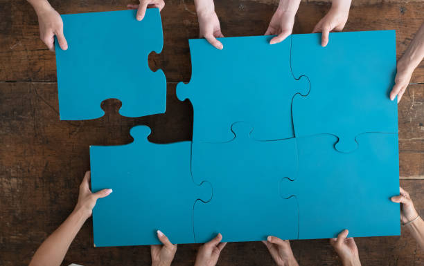 istock 6 pieces of a puzzle being put together 1280567805