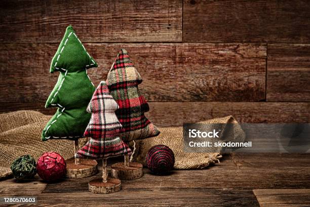Christmas Tree Decorations On A Retro Wood Background Stock Photo - Download Image Now